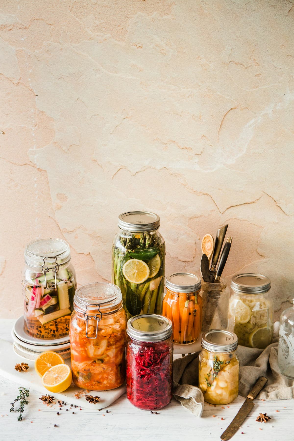 Jars of colourful fermented vegetables for gut health