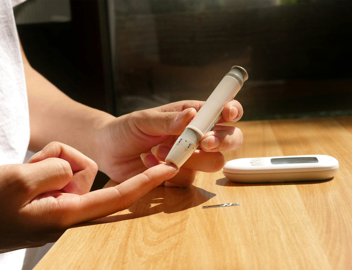 Blood sugar monitoring equipment on a table