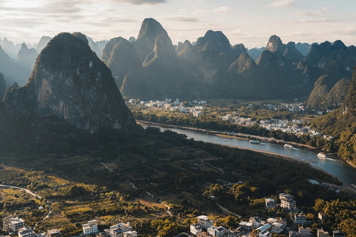 Sunrise over karst mountains and the river near Guilin, China